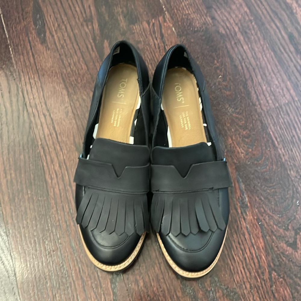 TOMS Mallory Black Leather Fringe Loafers